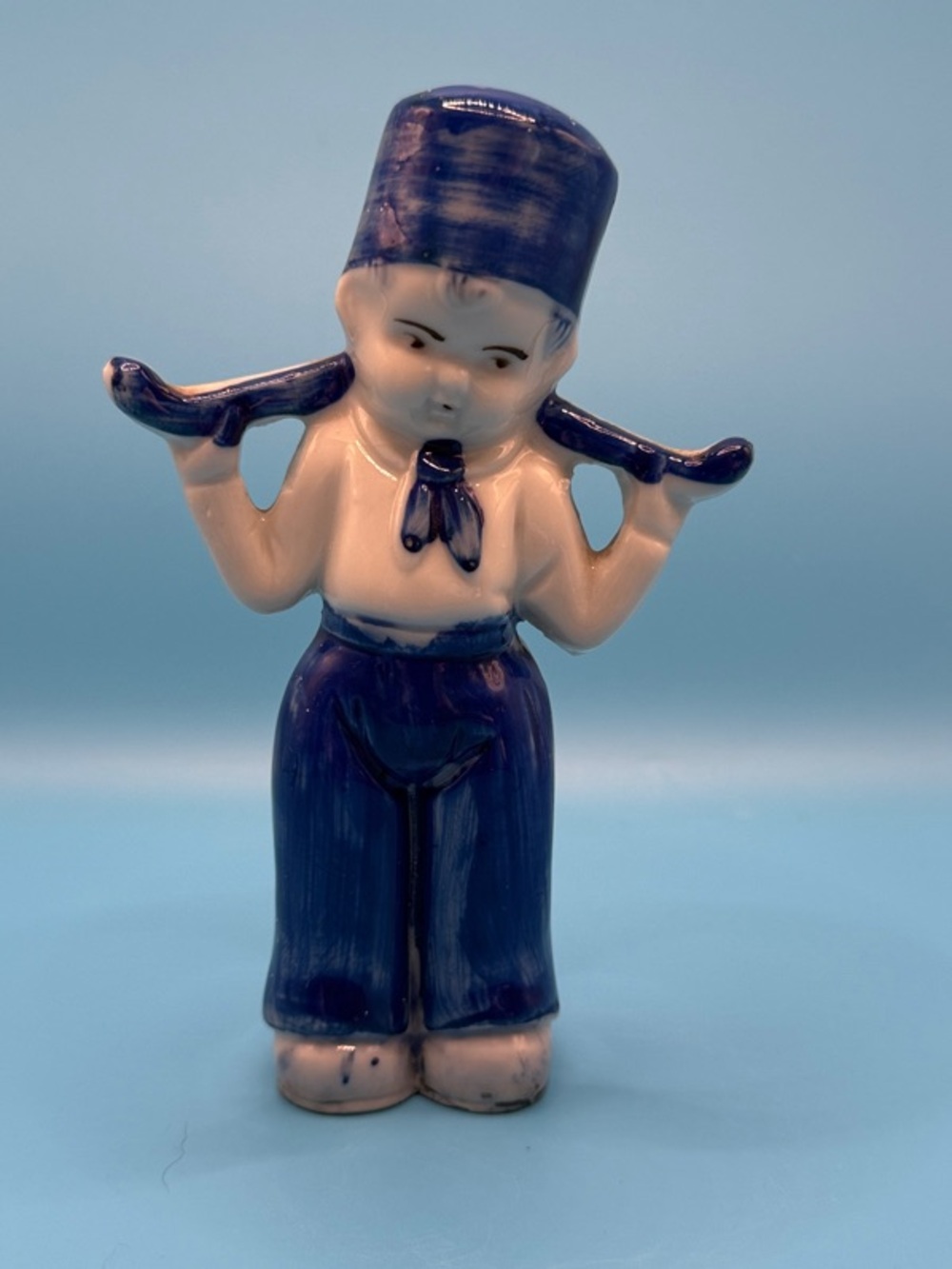 Vintage Porcelain Dutch Boy Figurine made in Japan.